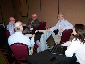 Larry Booth explains to Rick Cloud, Ron Sunker, Donald Coker and Jennifer Ramovs how he is going to implement Tabs3 Connect.  