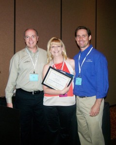 Britt Lorish accepts the PracticeMaster award on behalf of Affinity Roanoke.