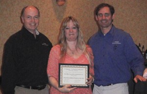 Cathy Prichard returns to the awards circle and accepts her PracticeMaster award.