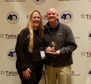 Cathy Prichard presents Joe Abler with a horse’s behind trophy for being her biggest PITA for 2018.