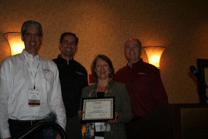 Judy Best and Rick Bernauer gladly accept their Tabs3 award.